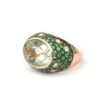 An 18 karat rose gold prasiolite, emerald and diamond cocktail ring