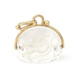 A 14 karat gold quartz fob swivle pendant