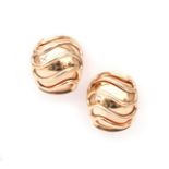 A pair of 18 karat rose gold earrings