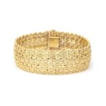 An 18 karat gold cuff bracelet
