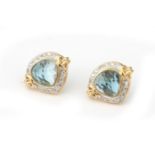 A pair of 18 karat gold topaz and diamond ear studs