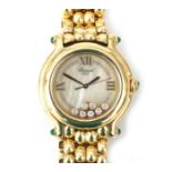 An 18 karat gold Chopard Happy Sport lady's wristwatch, 1995