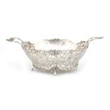 A 835 silver open worked bread basket with engraved foliate and flower-motifs, Holland, 1927.