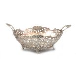 An 835 silver open worked bonbon dish with engraved decoration of stylized flowers, B.W. van Eldik,