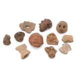 A collection of South American pottery fragments.