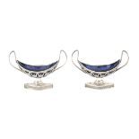 A pair of 835 silver urn-shaped salt cellars with original blue glass liners, Petrus Schuil, Leeuwar