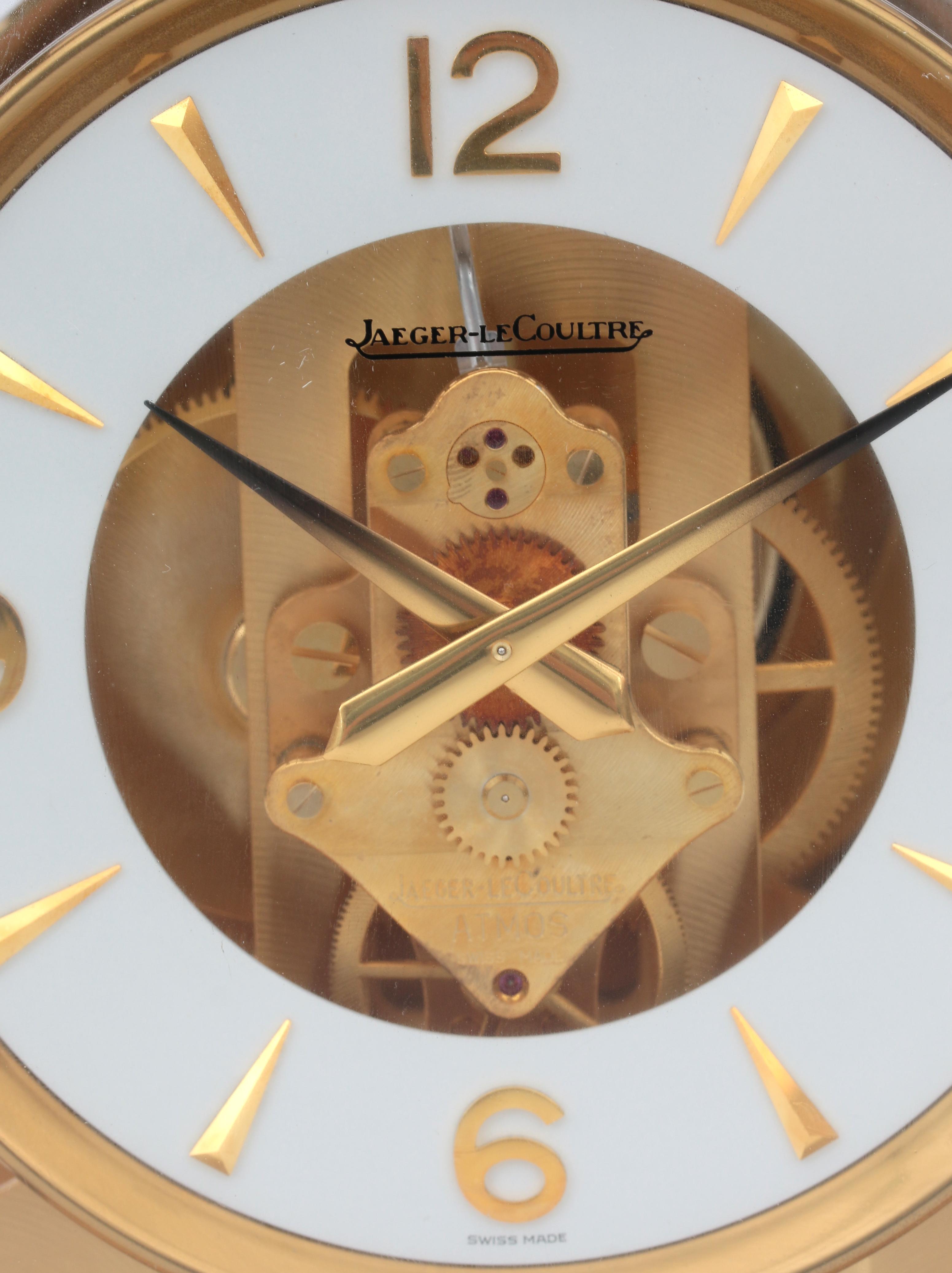 A perpetuum moving clock in gold-plated metal and glass case, Jaeger leCoultre, Swizerland, circa 19 - Image 2 of 5