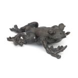 A bronze sculpture of a stylized frog, late Meiji-period.