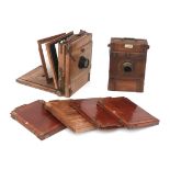 Two mahogany bellows camera, including four cardridges.