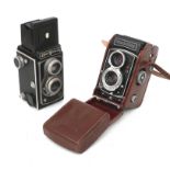Two cameras, Rolleicord Vb 1962-1977, with original case, and Montanus Delmonta.