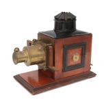 A mahogany magic lantern, together with a collection of glass slides, Triumph, probably England, cir