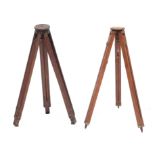 Two wooden tripods, 120 cm and 100 cm high, early 20th century.