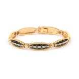 An 18 karat gold enamel and diamond bracelet
