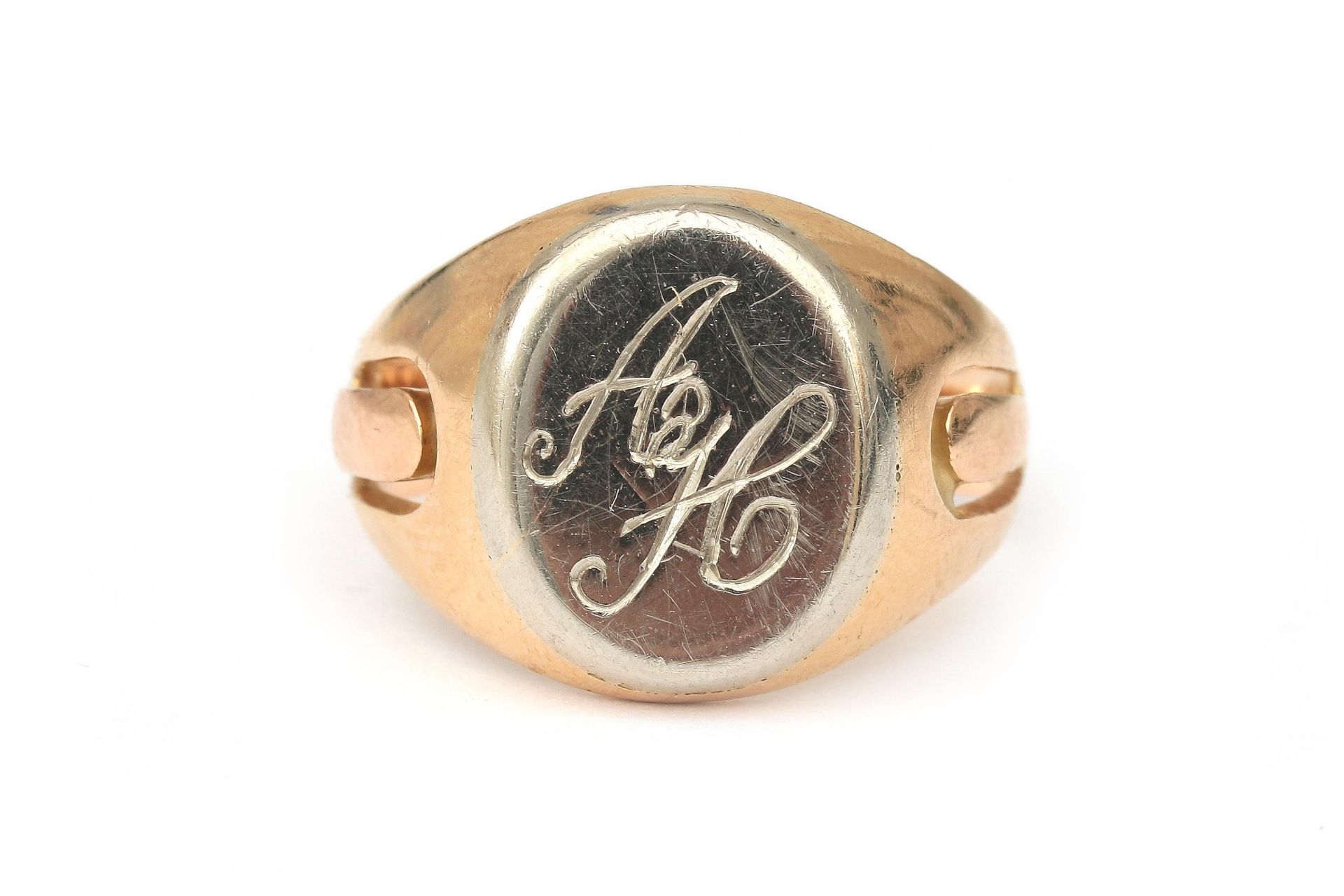 A 14 karat gold  two tone signet ring