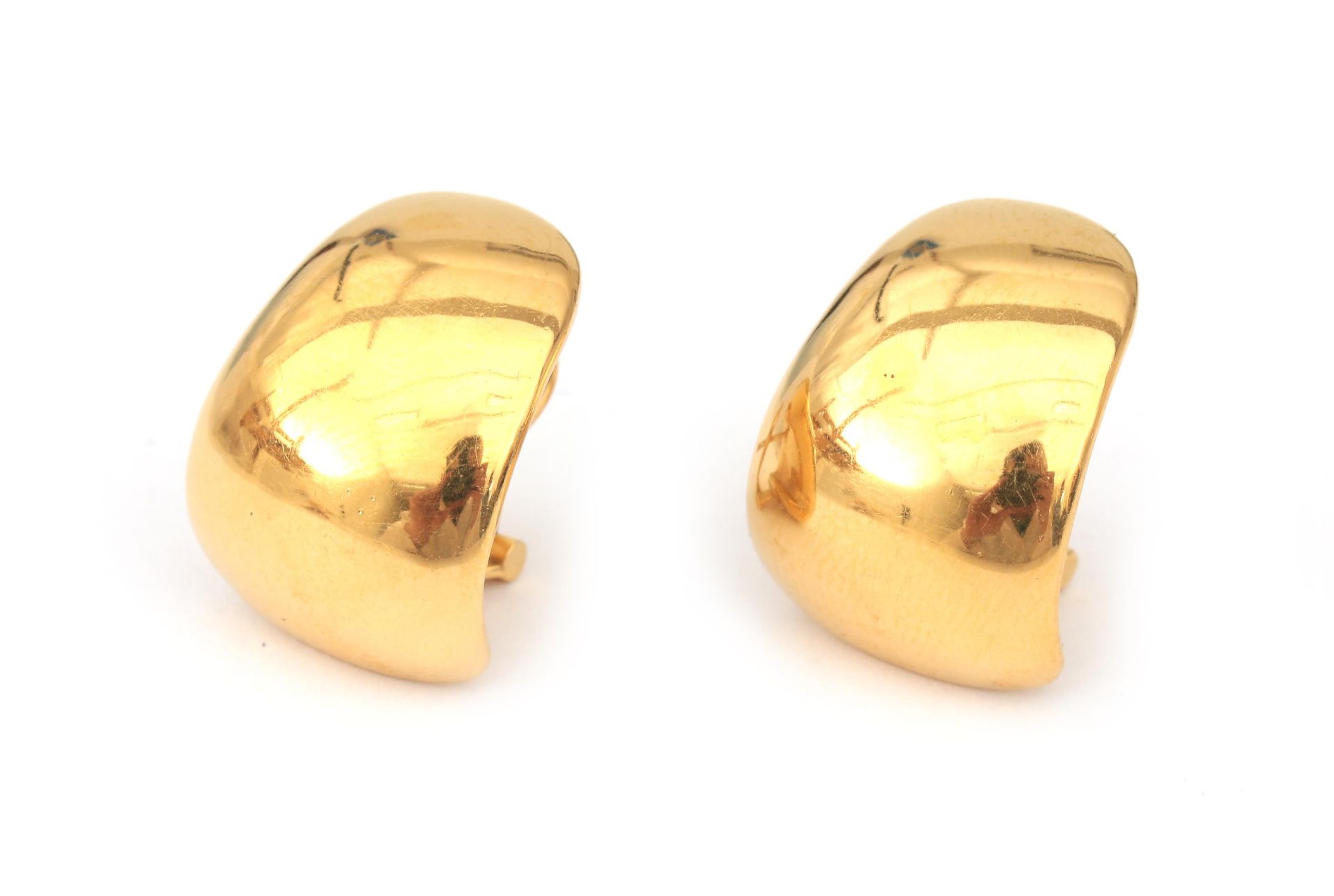 A pair of 14 karat gold earrings