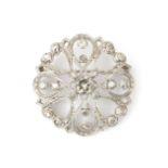 A 14 karat white gold diamond brooch