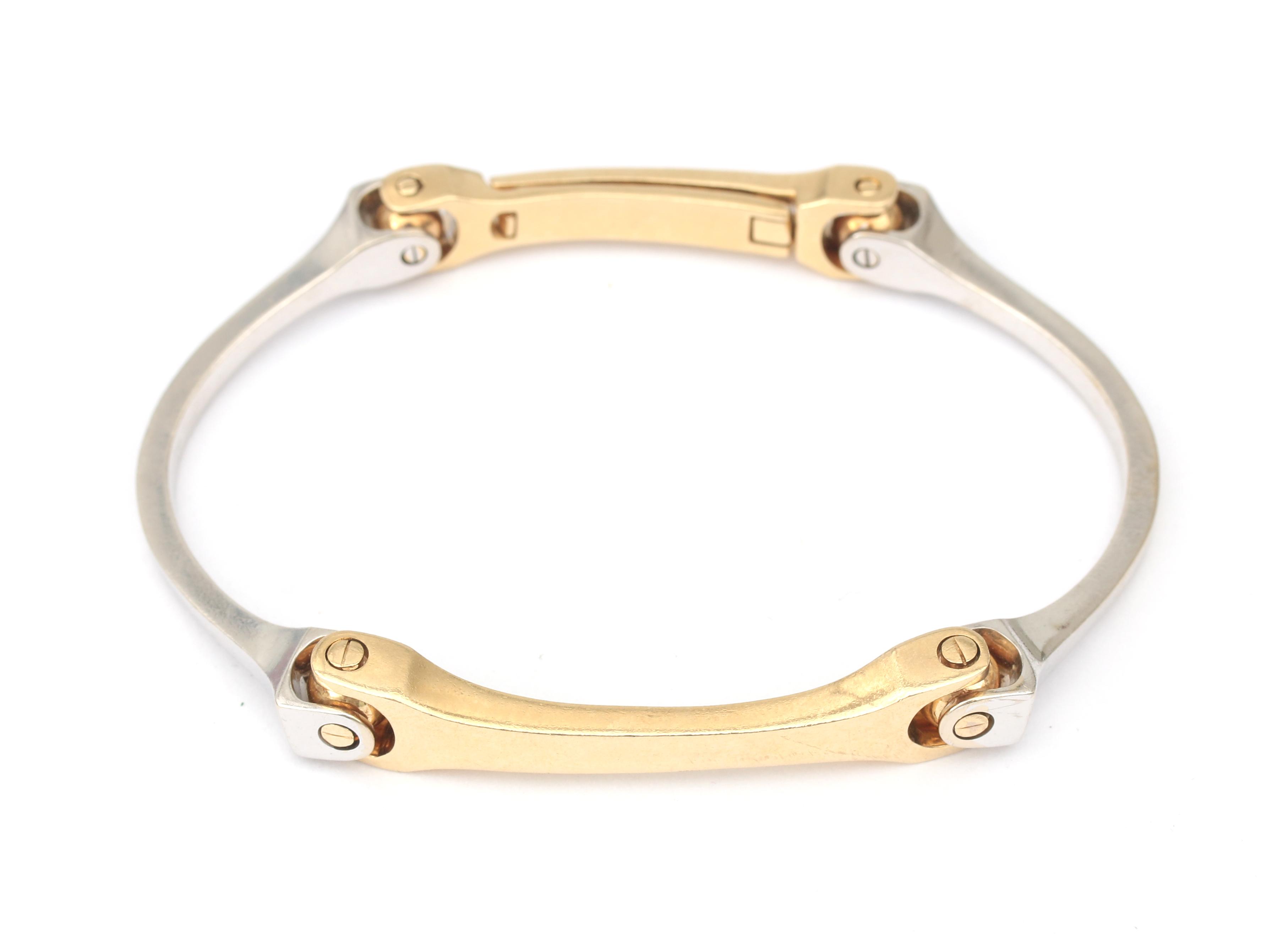 A 14 karat gold two tone bracelet