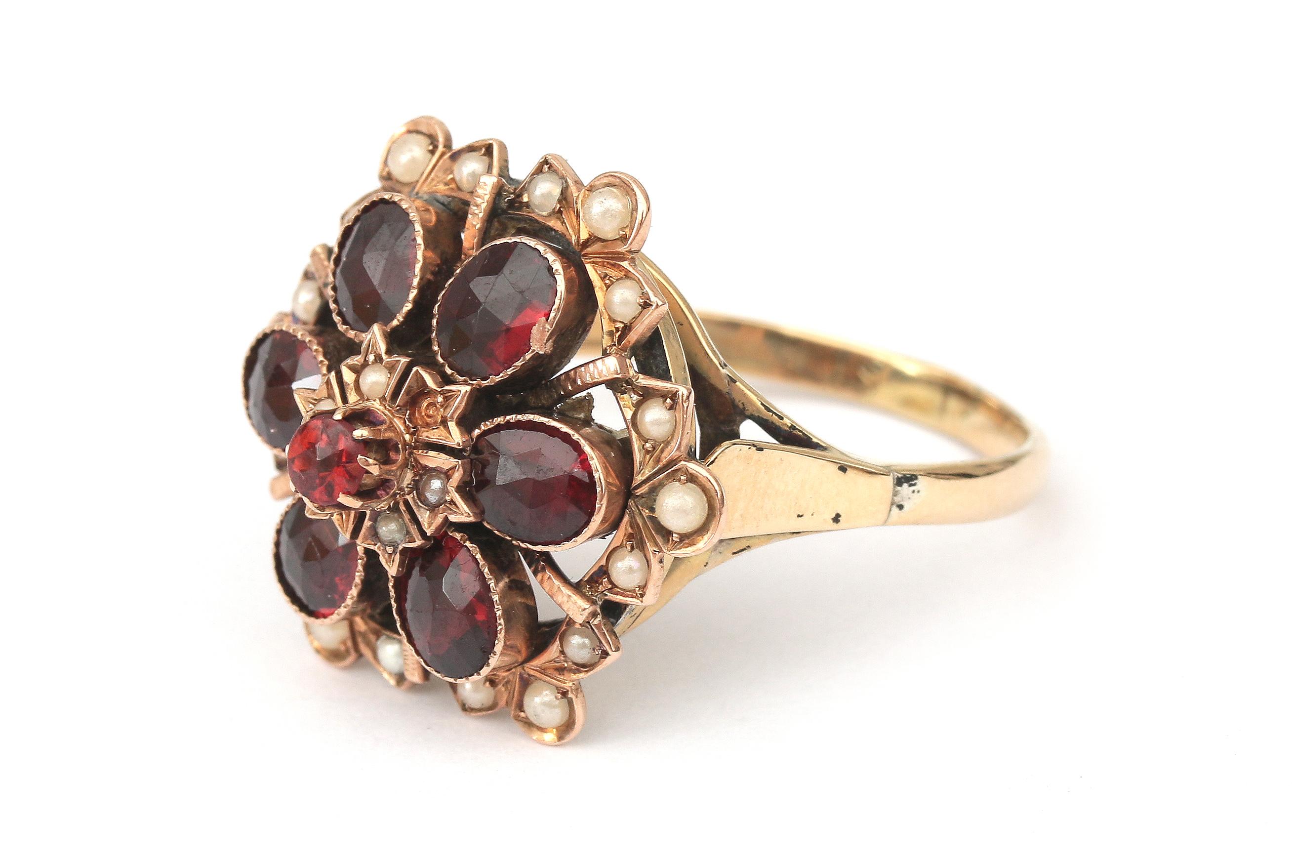 A gold garnet and pearl cluster flower ring - Image 2 of 3