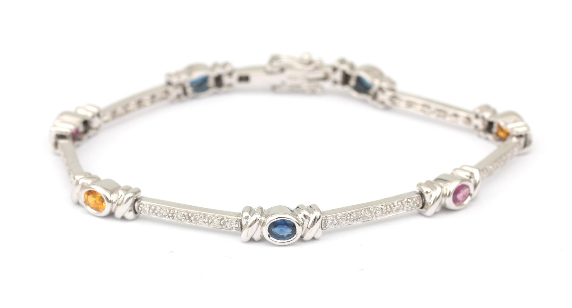 An 18 karat white gold sapphire and diamond bracelet