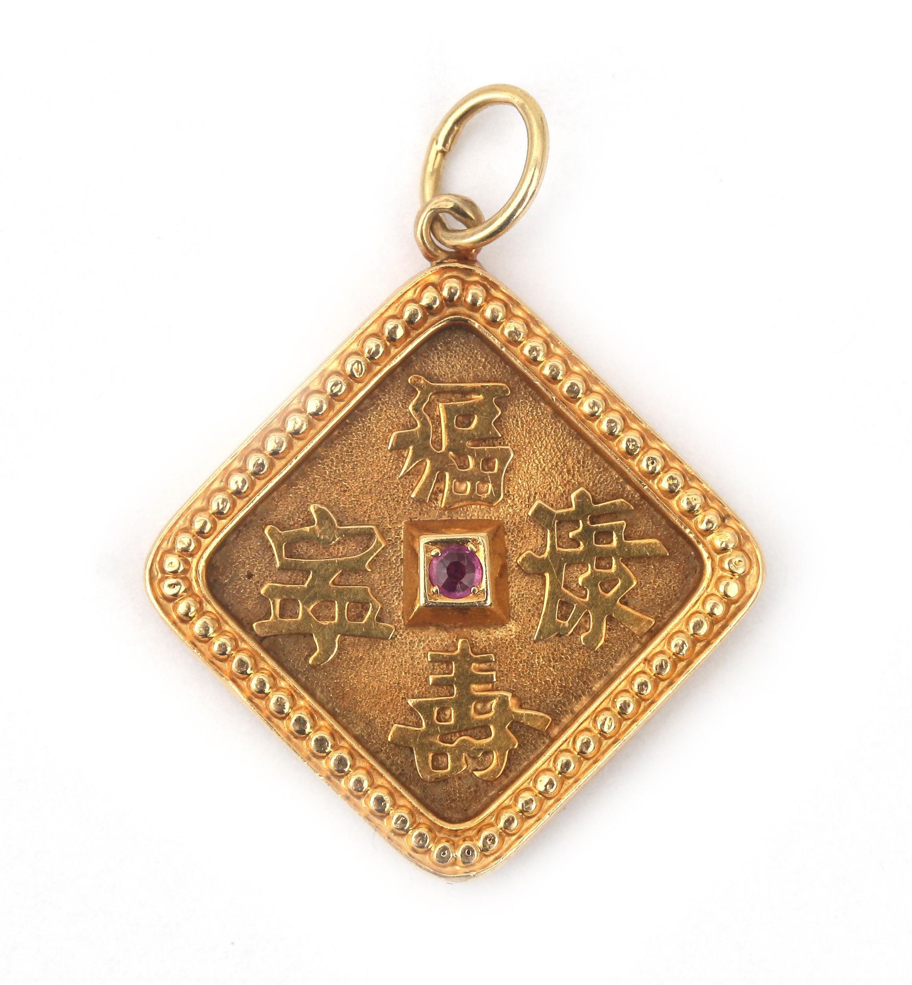 A 14 karat gold pendant with Chinese characters