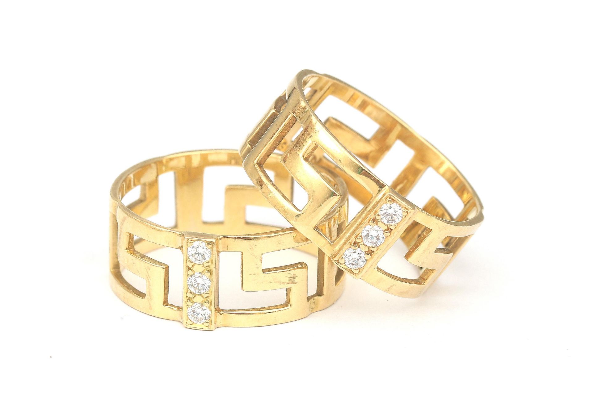 A pair of 18 karat gold diamond meander rings - Bild 2 aus 2