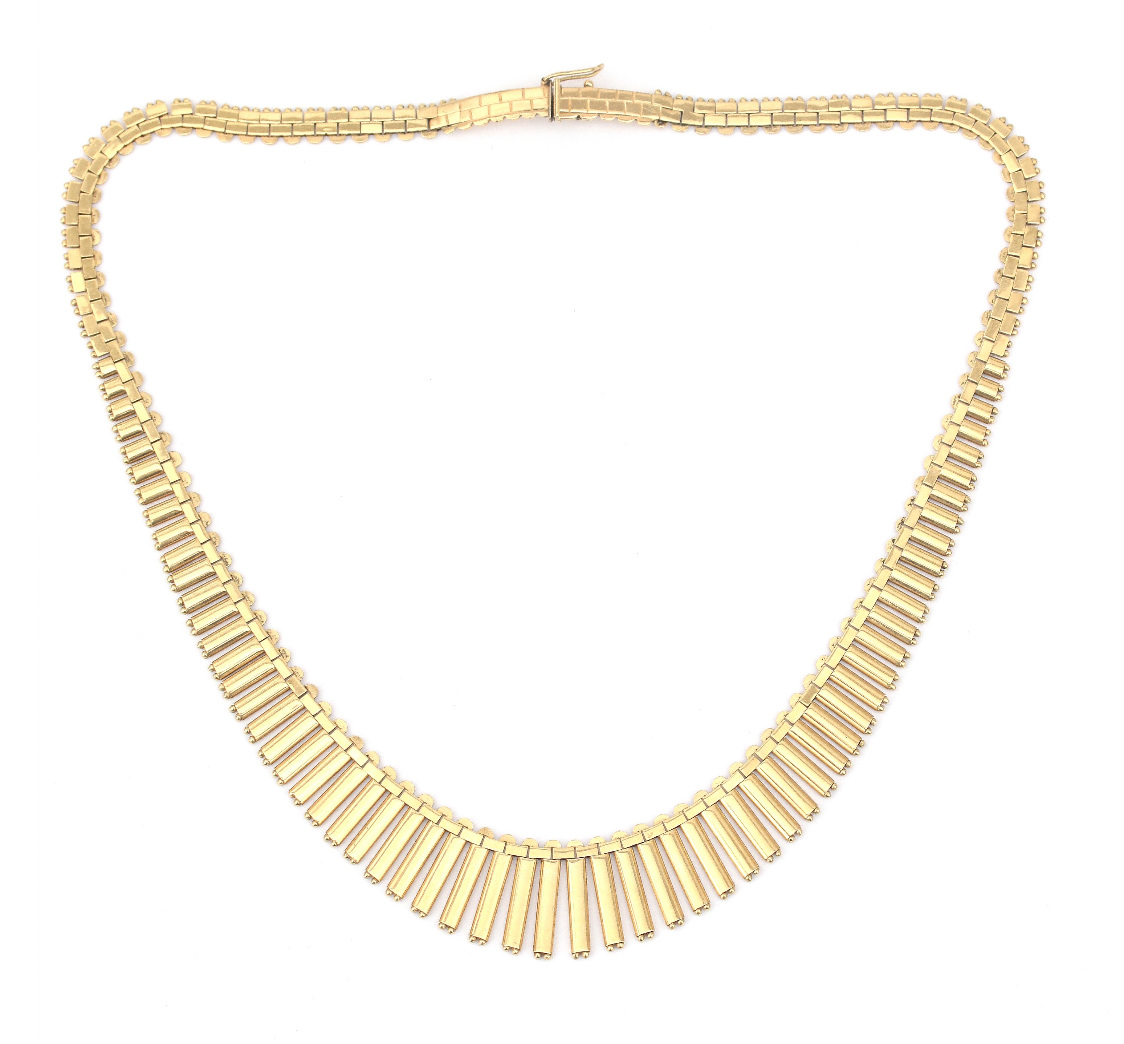 A 14 karat gold fringe necklace