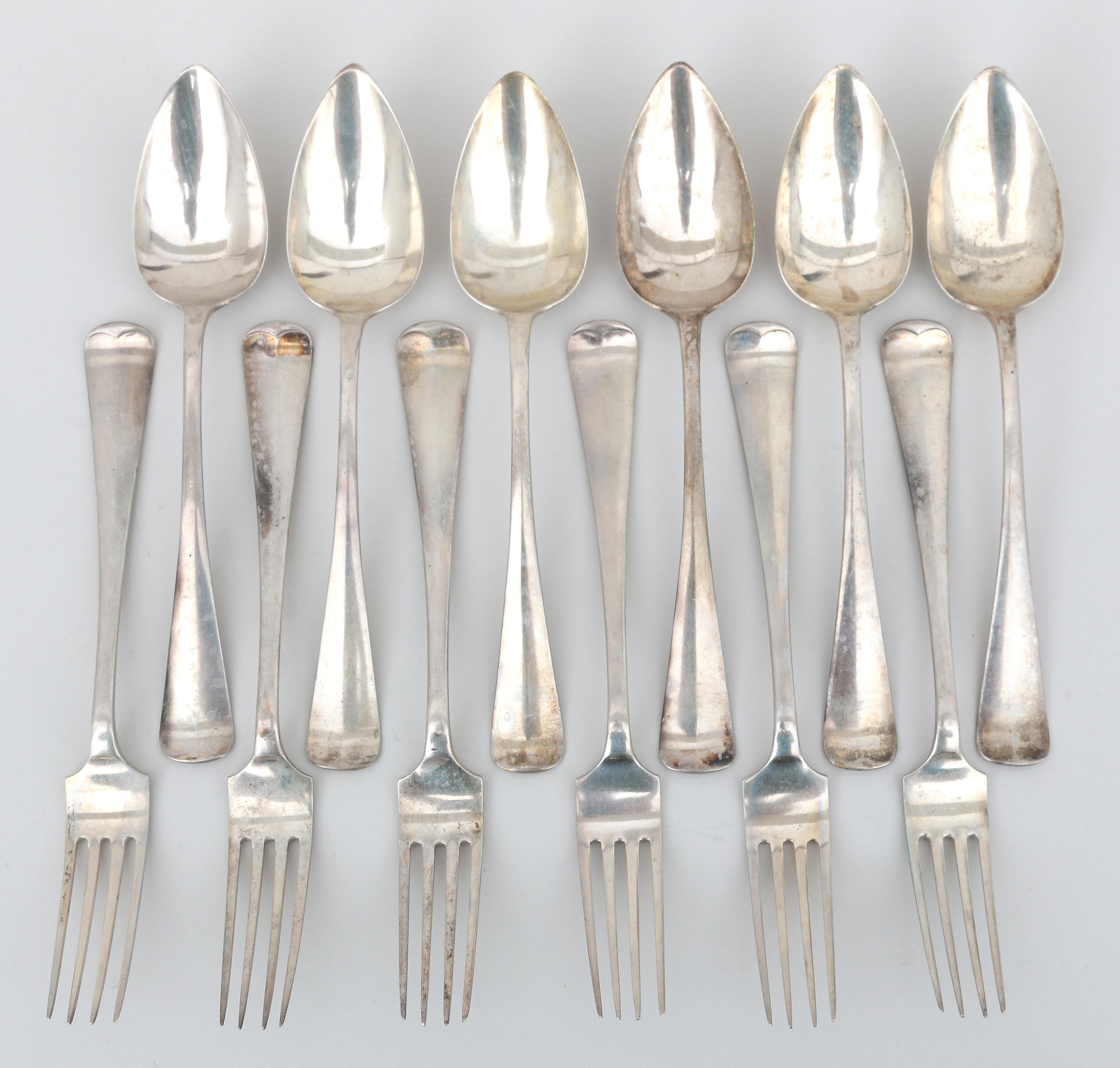 Six silver table spoons and forks, Haags lof.