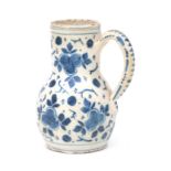 A Delft blue earthenware jug.