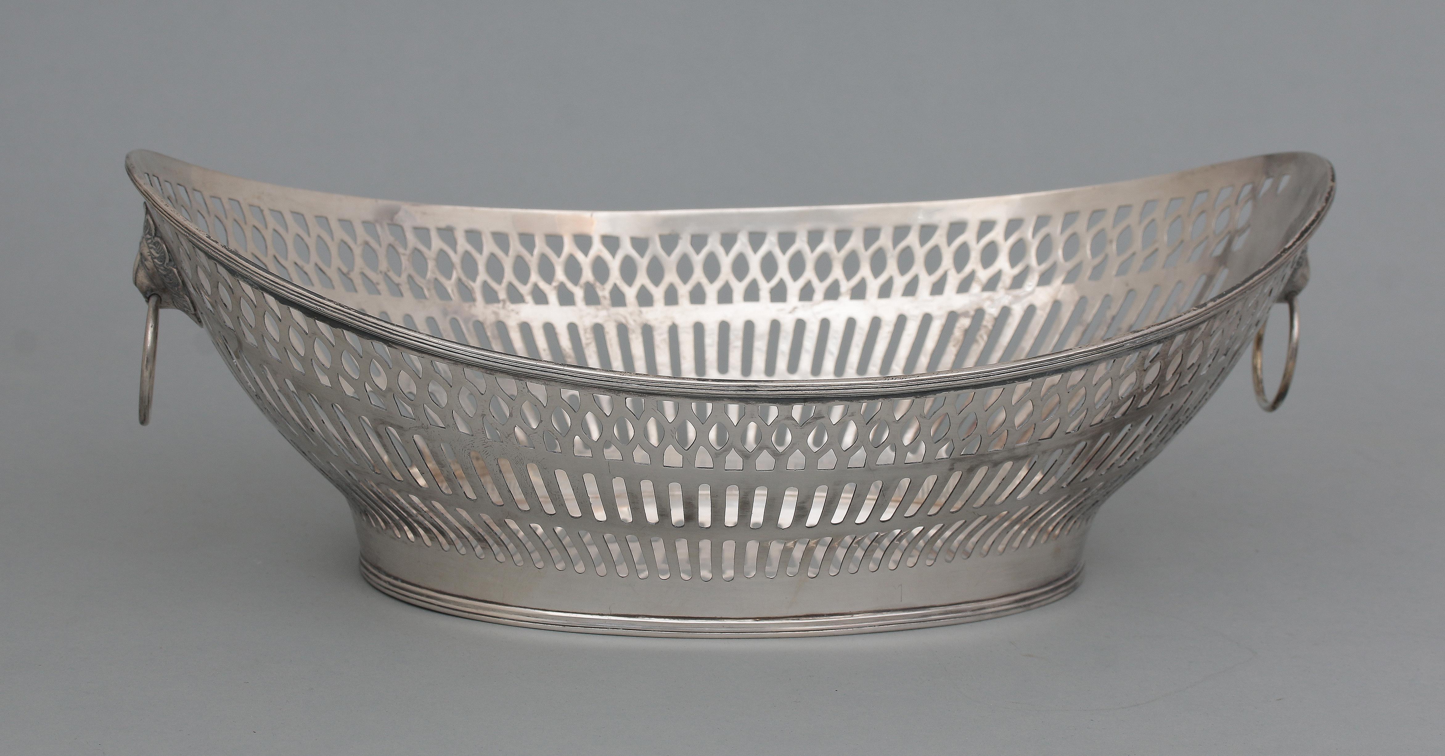 A pierced silver bread basket.