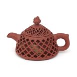 A Yixing teapot.