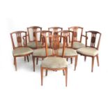 Eight elmwood Louis-Seize chairs.