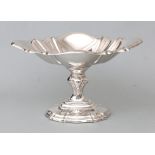 An oval silver dish on foot,