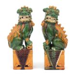 A pair of Chinese earthenware lion's, late 19th century.