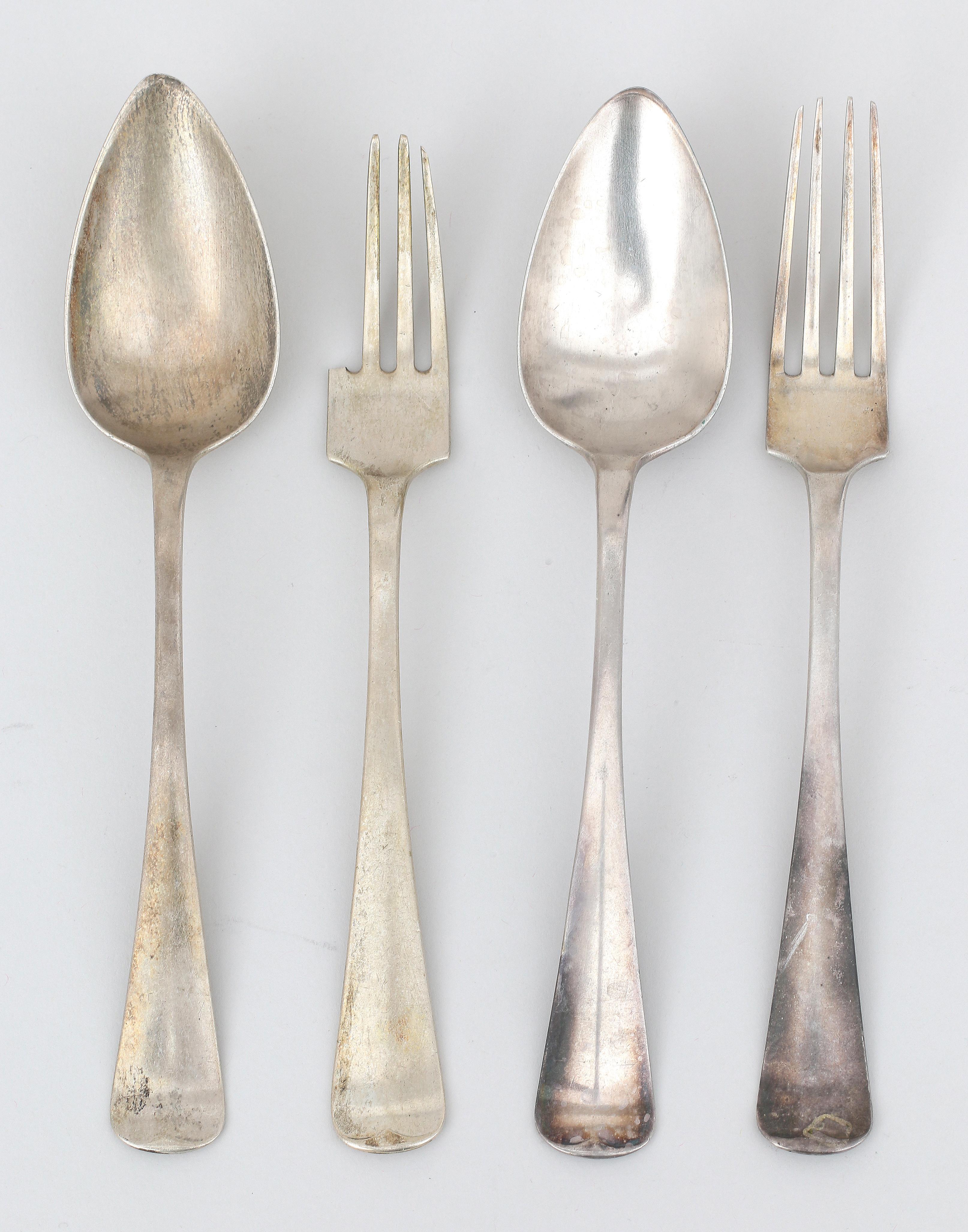 Two silver table spoons and forks, Haags lof.