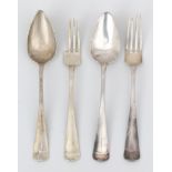 Two silver table spoons and forks, Haags lof.