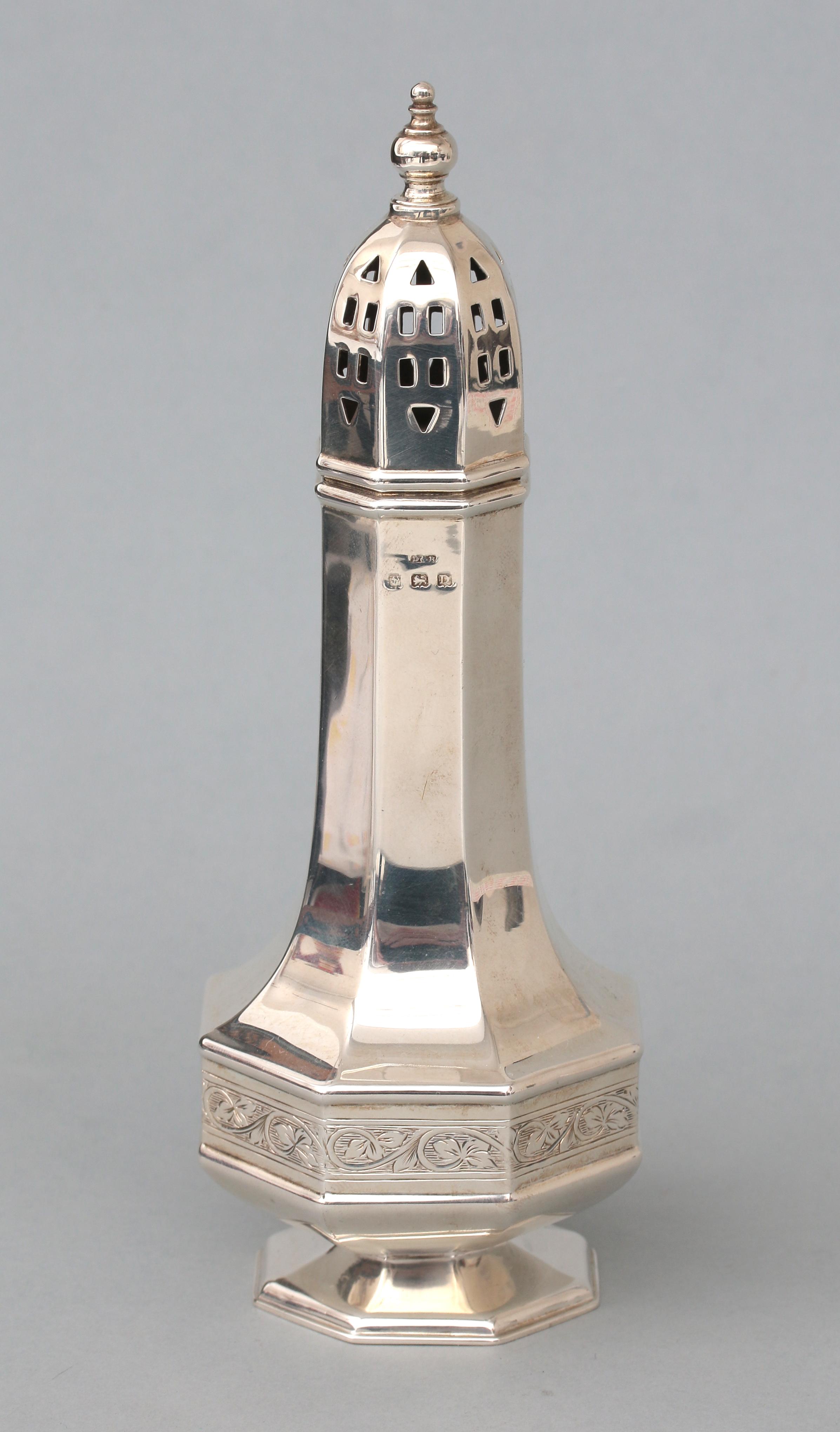 A silver sugar caster.