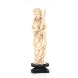An ivory figure of a lady with a sword, circa 1900.