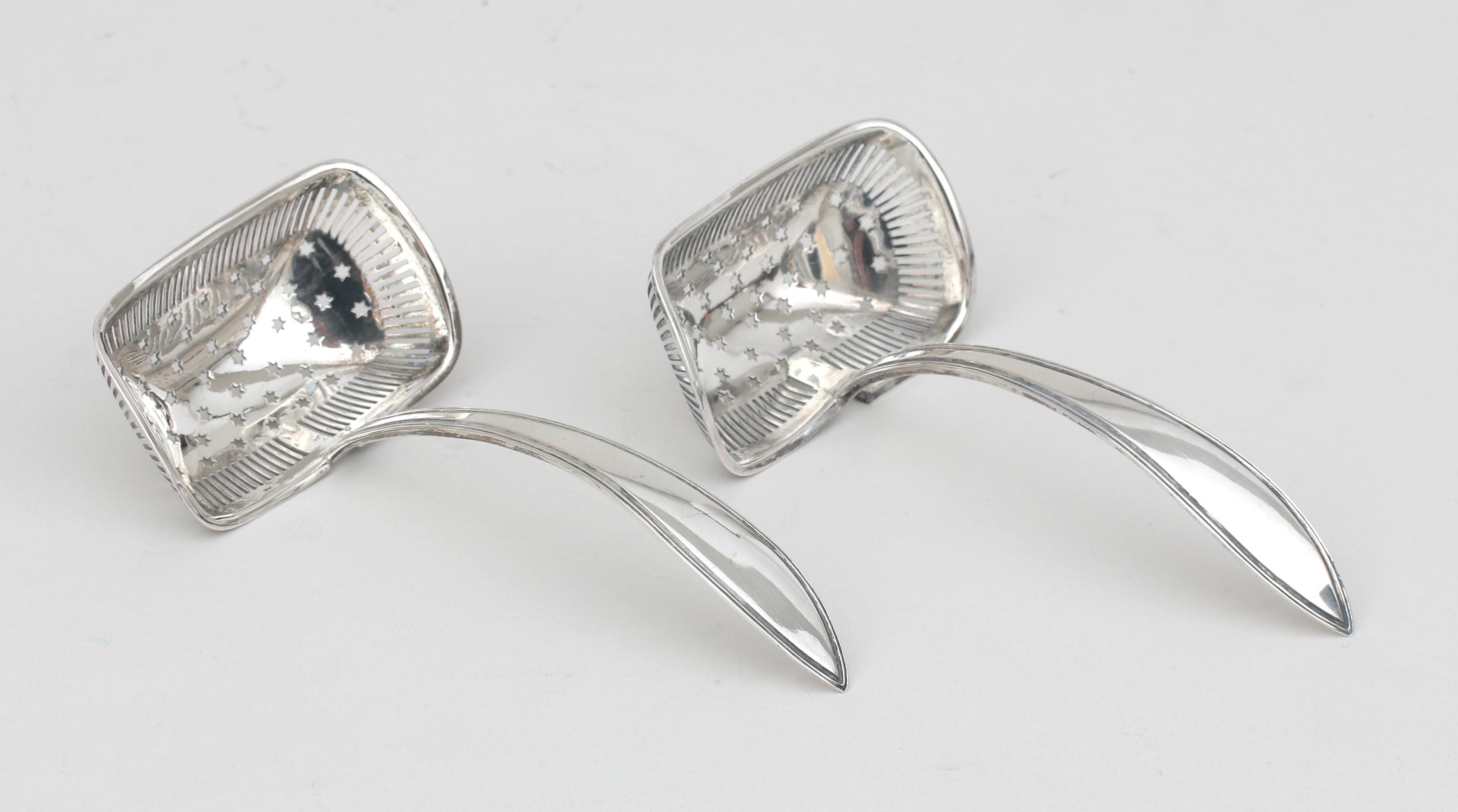 A pair of 835 silver sugar sifter spoons, 1818.