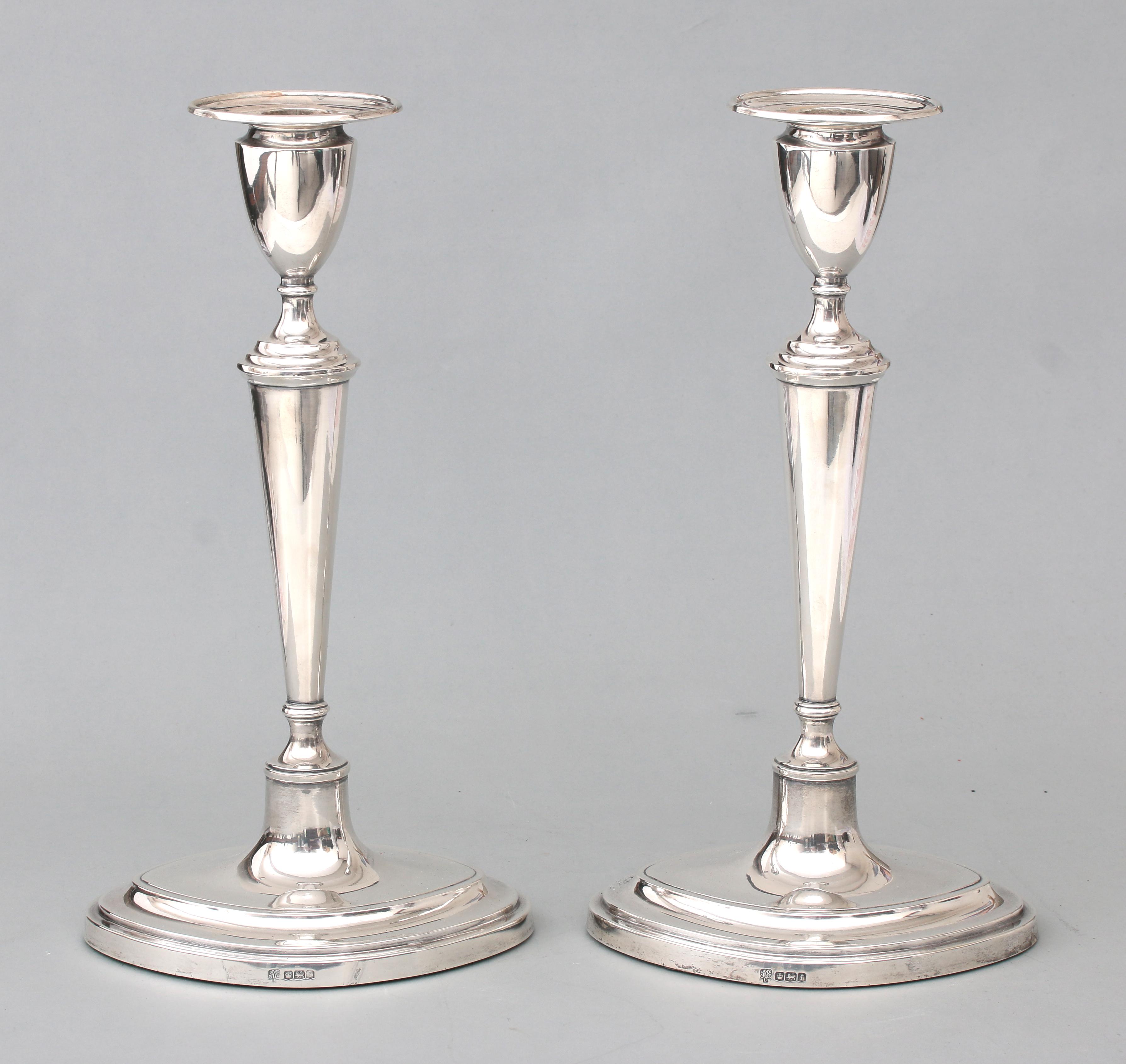 A pair of 925 silver table candlesticks.