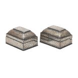 Pair of lidded boxes inlaid with silver