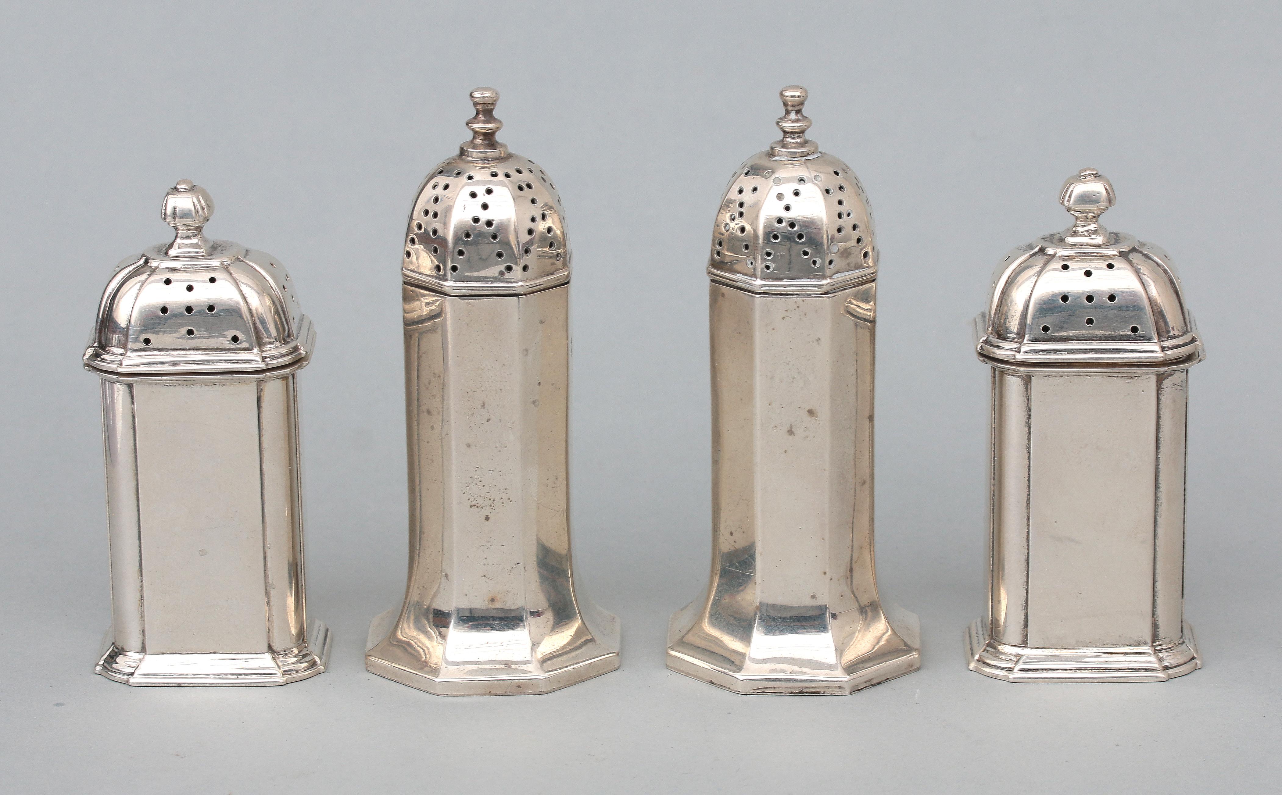Two English pair of silver salt shakers.