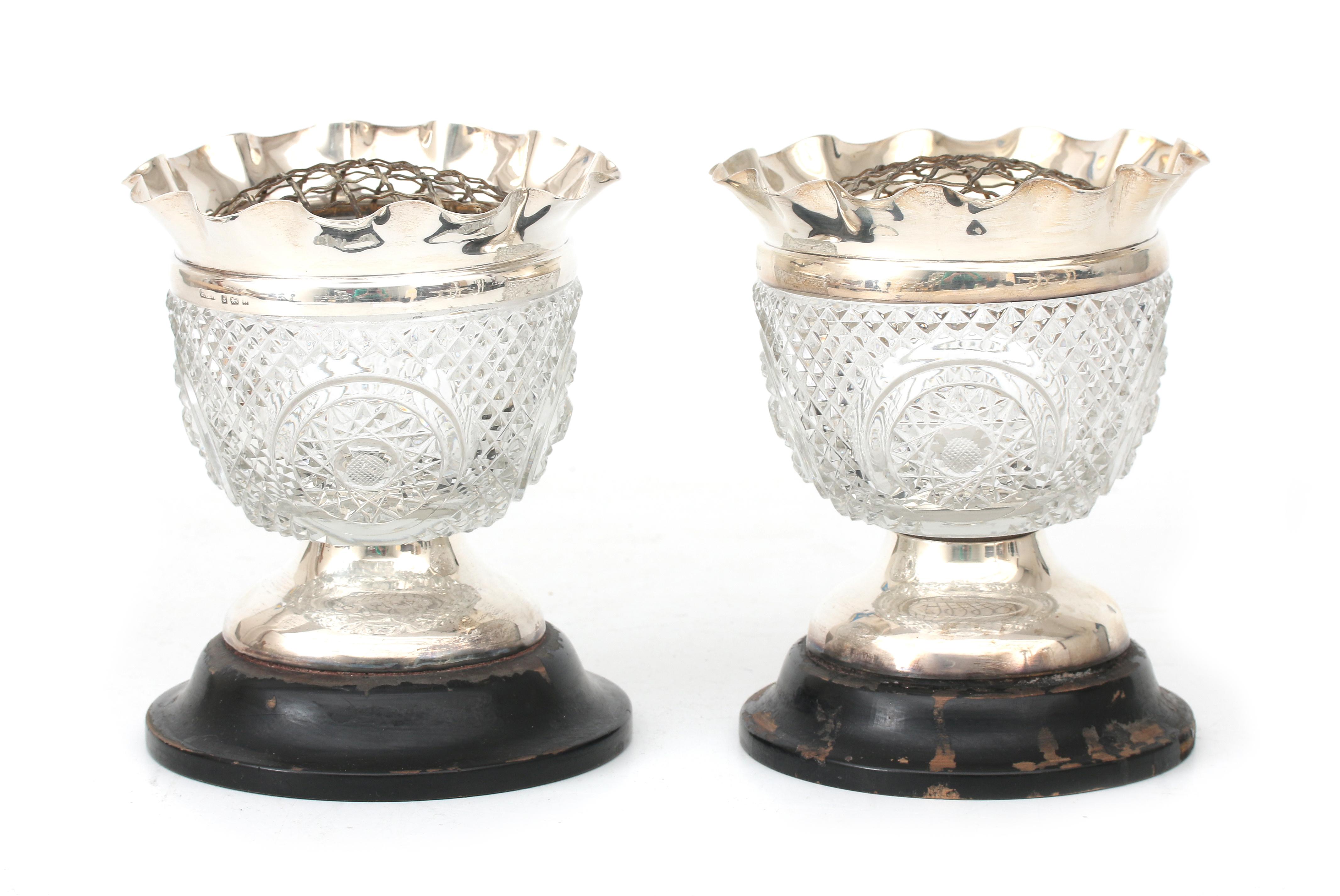 Two silver mounted crystal vases.