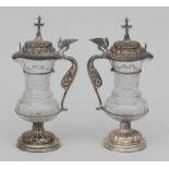 A pair of silver mounted cruet ampoules.