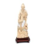 A Chinese ivory carving of a fisherman, ca. 1930.