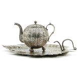 A Silver Teapot and Tray