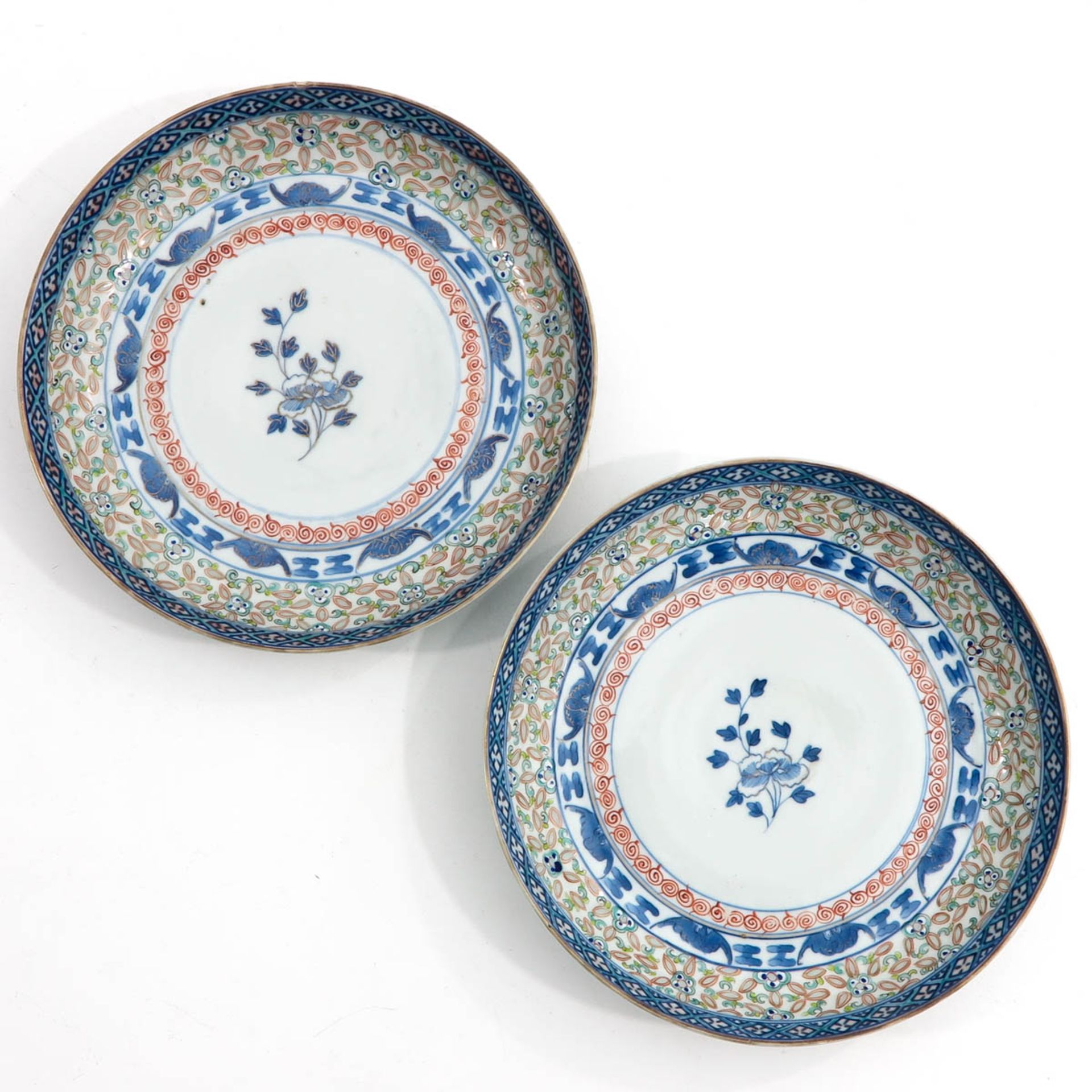 A Pair of Polychrome Decor Plates