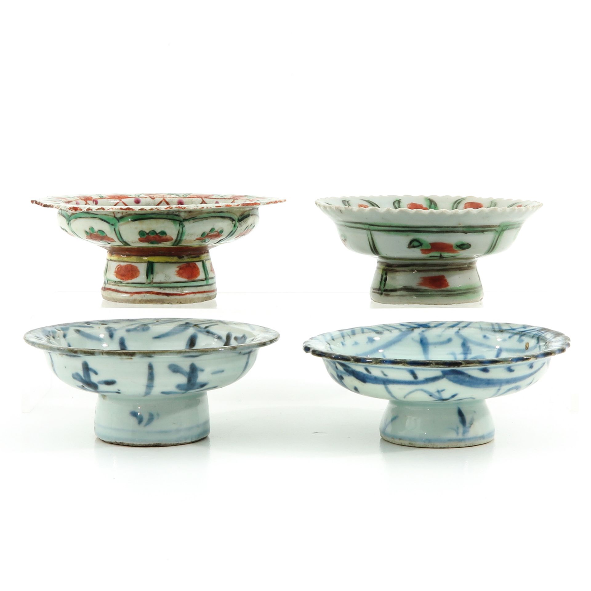 A Collection of 4 Stemmed Bowls