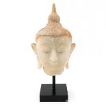 A Carved Alabaster Buddha Sculpture