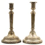 A Pair of English Silver Candlesticks