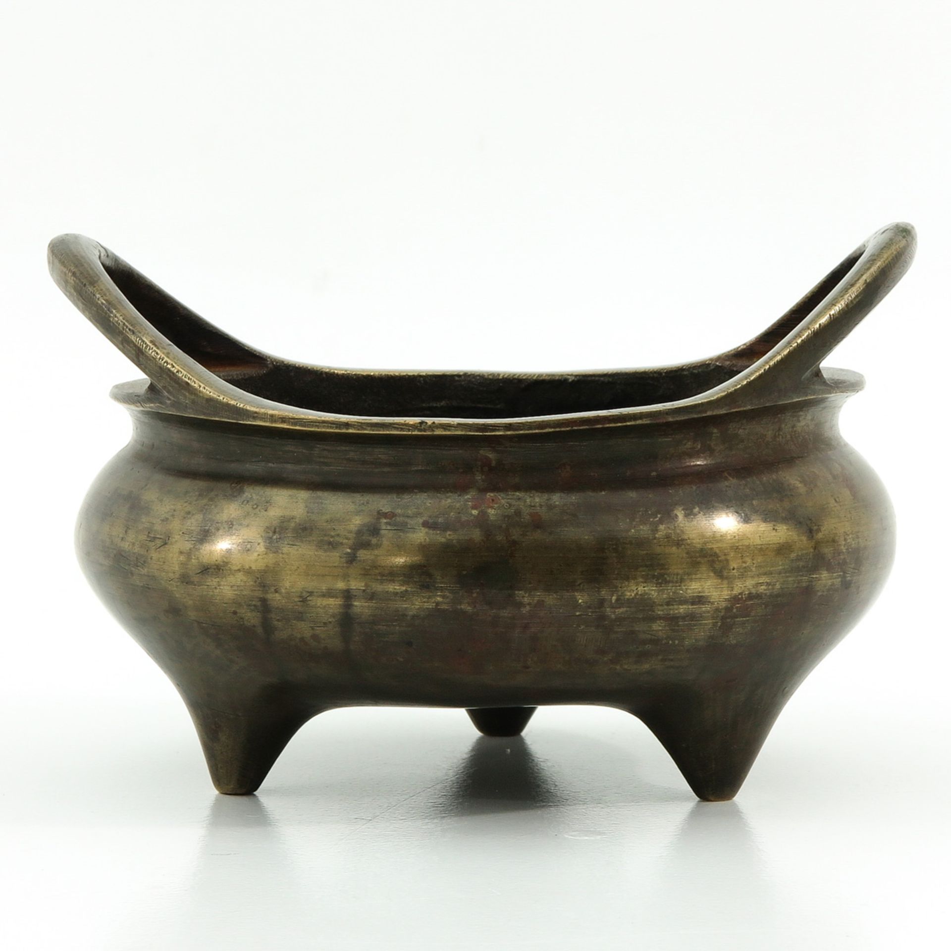 A Bronze Tripod Censer